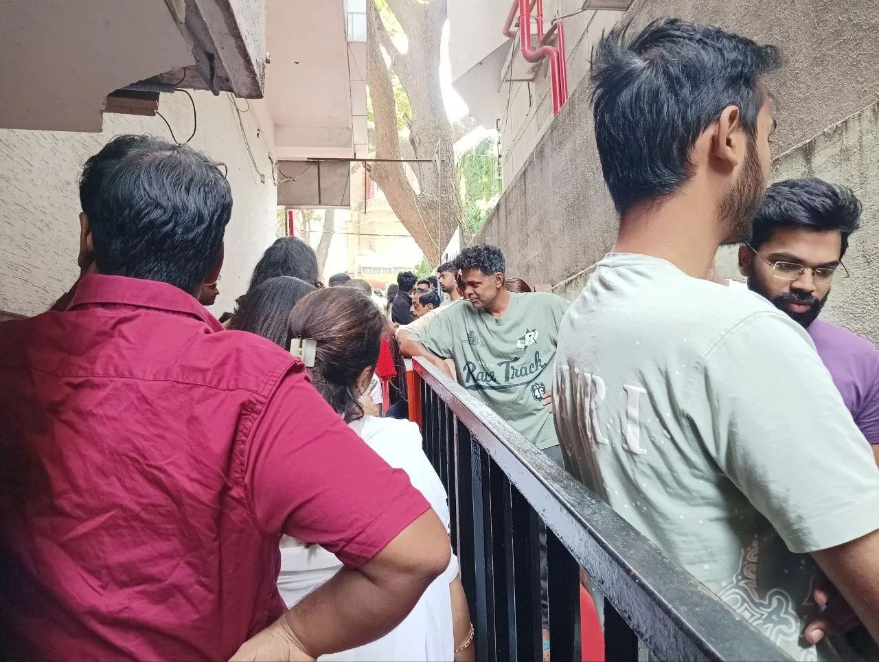 Me standing in a queue